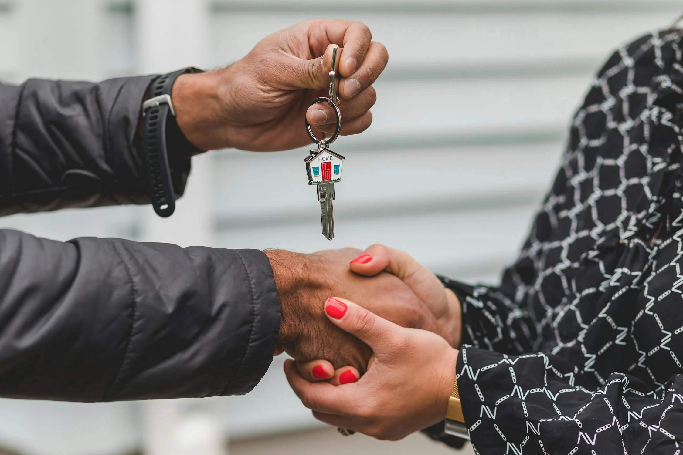 Happy family with new home keys